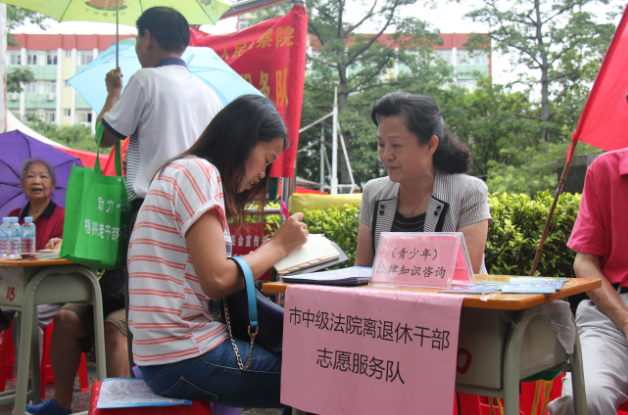 1469146924658386.png 梧州市开展离退休志愿者服务队集中服务活动.png